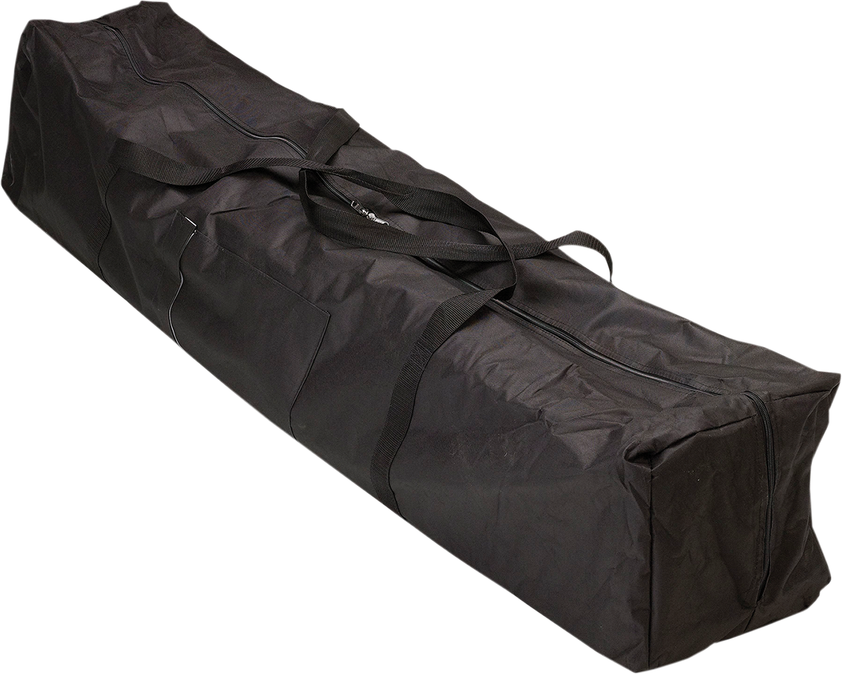 A large, rectangular black duffel bag made of fabric sits on a white background. It has two black carrying handles and a long zipper running along the top, with a stitched side pocket visible on one of its broader surfaces.