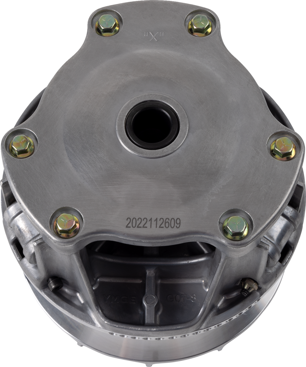 A close-up view of a round metallic mechanical component with a central circular hole, six bolts around the top edge, and engraved number 2022112609 on the surface. The part appears industrial, with a smooth finish and visible assembly features.