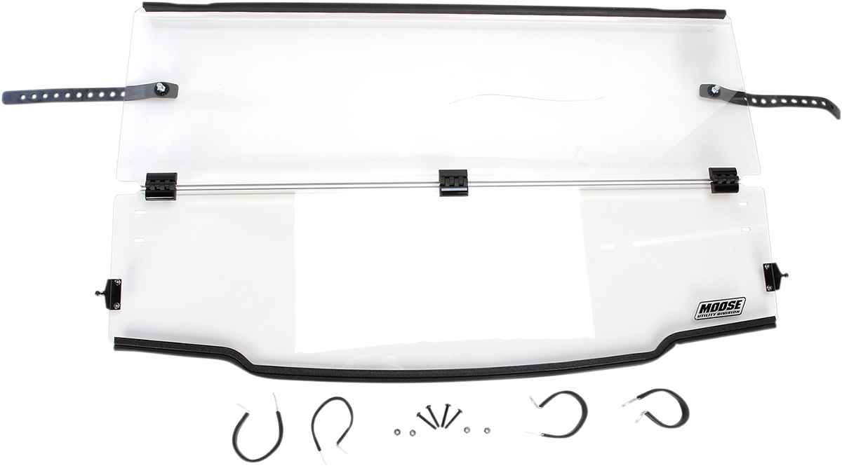 A clear, rectangular windshield panel with black mounting brackets and hardware attached on both sides, sitting above various small metal and rubber mounting components displayed in a row. The lower right corner features a Moose Utility Division logo.