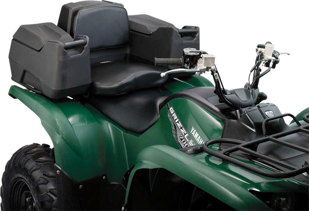 A close-up of a green Yamaha Grizzly all-terrain vehicle (ATV) showing the front handlebars, black seat with backrest, and two large, black, hard storage boxes mounted at the rear. The vehicle appears sturdy and is designed for rough terrain.