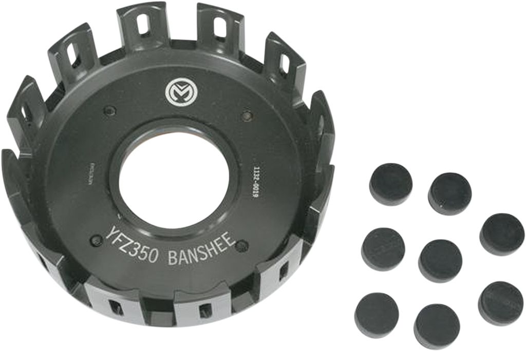 A black metal clutch basket labeled YFZ-350 BANSHEE with a circular center hole and rectangular slots around the edge, displayed alongside nine small black cylindrical rubber plugs arranged in rows.