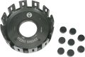 A black metal clutch basket labeled YFZ-350 BANSHEE with a circular center hole and rectangular slots around the edge, displayed alongside nine small black cylindrical rubber plugs arranged in rows.