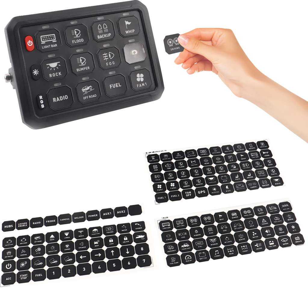 A hand holds a black button with white icons, about to place it on a rectangular electronic switch panel with preset buttons. Below are four sheets of various black button labels, each featuring white symbols and text for different functions.