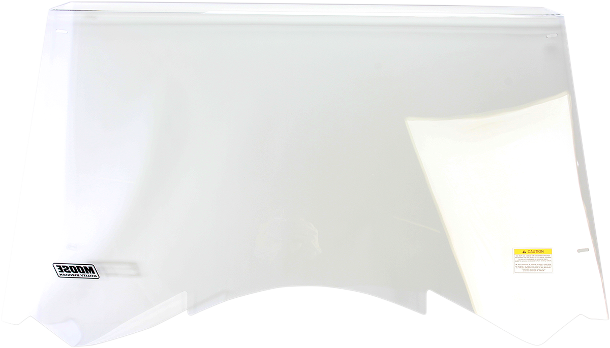 A clear, slightly curved motorcycle windshield with a label in the bottom left corner and a yellow caution sticker on the lower right. The surface is transparent, showing minor reflections, and the background is plain white.