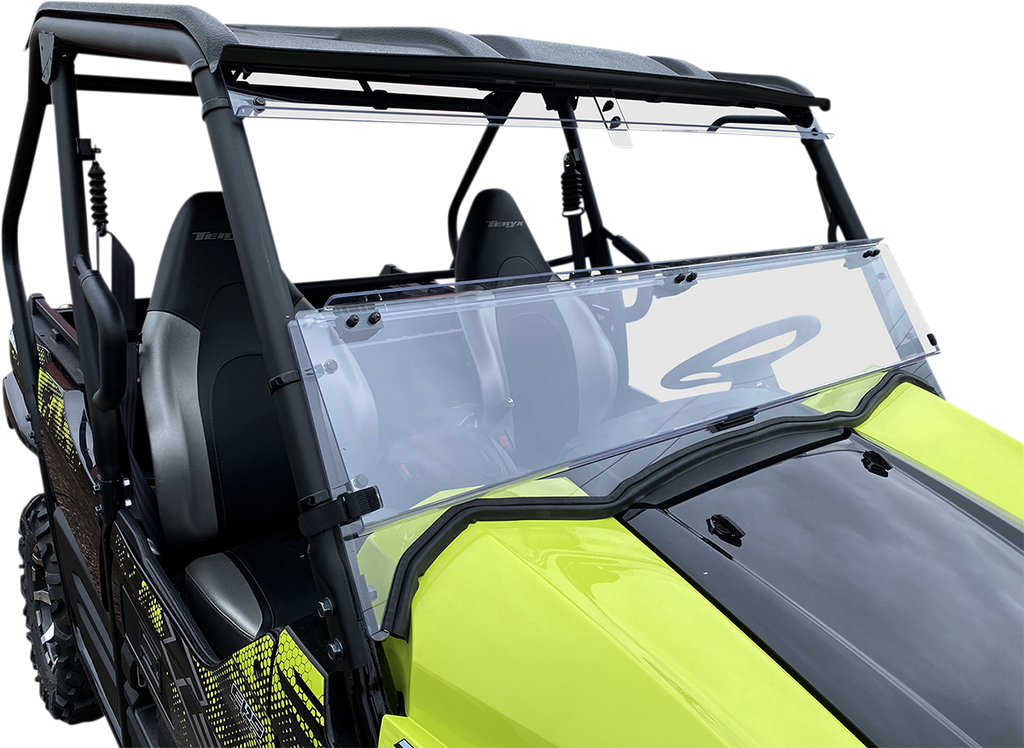 A bright yellow off-road utility vehicle with a clear, two-piece polycarbonate windshield and black roof. The windshield is partially open, revealing two black seats and a black dashboard, with a white background isolating the vehicle.