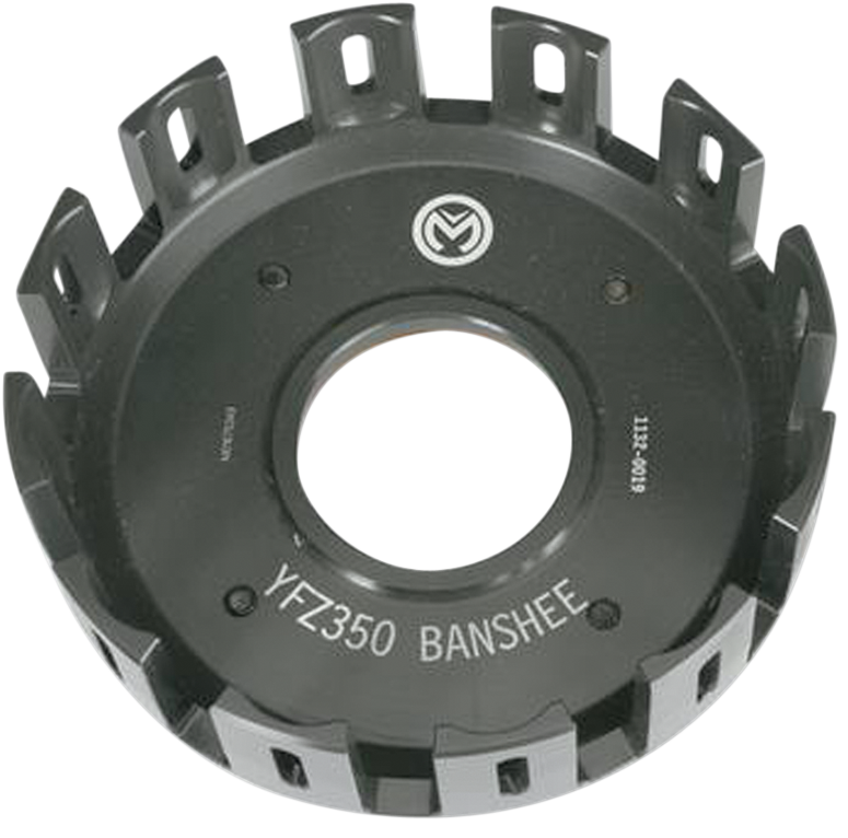 A black metal clutch basket labeled YFZ350 BANSHEE with evenly spaced rectangular slots around the perimeter and a large central circular hole, viewed from above. A small circular logo is visible at the top center.
