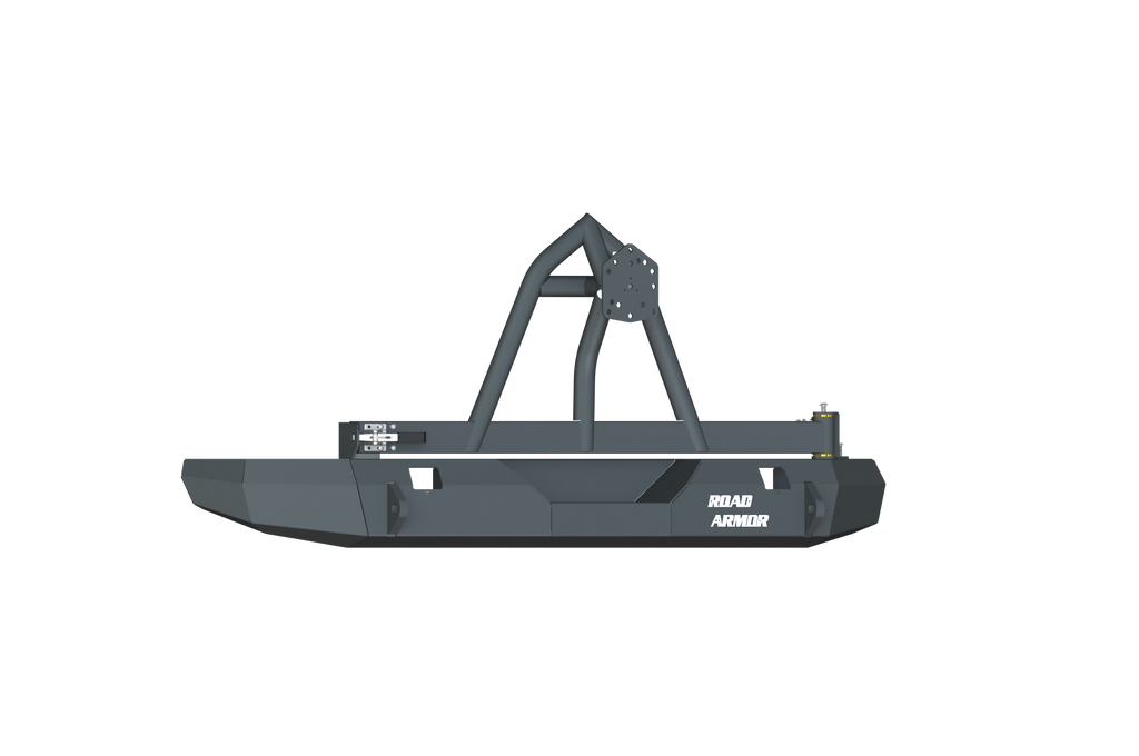 A rugged, geometric Stealth Rear Non-Winch Bumper with tire carrier in textured black for 2007-2017 Jeep JK, featuring angular metal construction and a built-in grille guard. “ROAD ARMOR” is printed in white on the right side.