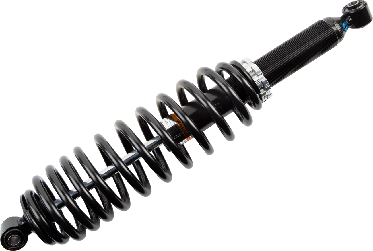 A black coilover shock absorber with a tightly wound spring around a cylindrical damper, featuring mounting points at both ends. The image is taken against a plain white background, showing the shock absorber at a diagonal angle.