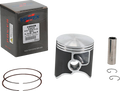 A Vertex piston kit is shown, including a black and silver metal piston, two thin piston rings, a cylindrical wrist pin, two small circlips, and a branded Vertex box with a white label listing model and size details. All items are on a plain white backgro