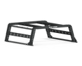 The 2005+ Nissan Frontier Treck Overland Bed Rack System for 5ft mid-size truck beds features a textured black metal frame with perforated beams, includes bracket kit, rear strap, upper & lower rails. ROAD ARMOR is printed in white on the side.