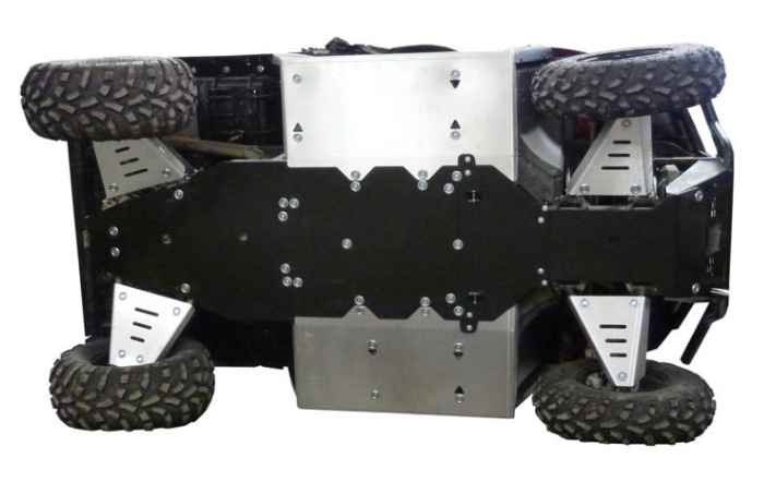 A Polaris Ranger 570 (-2014) is flipped on its side, revealing large rugged tires and a skid plate full set (aluminium/plastic) that securely covers the underside with bolts, providing reinforced protection for rough terrain.