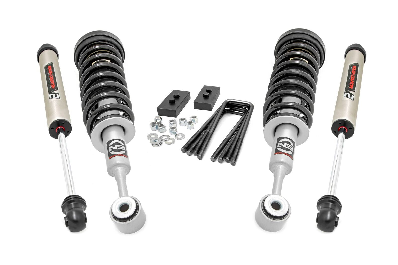 A 2.5 Inch Lift Kit for Ford F-150 (2004-2008) is displayed with N3 struts featuring a red, black, and white N3 Rough Country logo, black mounting blocks, washers, nuts, and four black U-bolts on a white background.