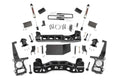 The 4 Inch Lift Kit | V2 for Ford F-150 4WD (2011-2014) includes black steel brackets, crossmembers, knuckles, shock absorbers, bolts, nuts, washers, and spacers neatly separated and displayed on a white background.