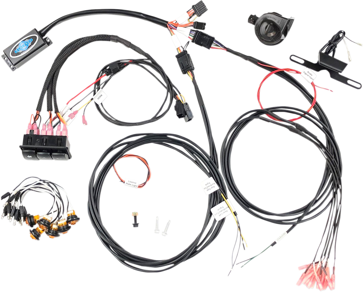 A vehicle wiring harness kit is shown with multiple black cables, connectors, switches, labeled wires, and electronic components arranged on a white background. Some connectors have pink tips, and there are small accessories like fuses and switches includ