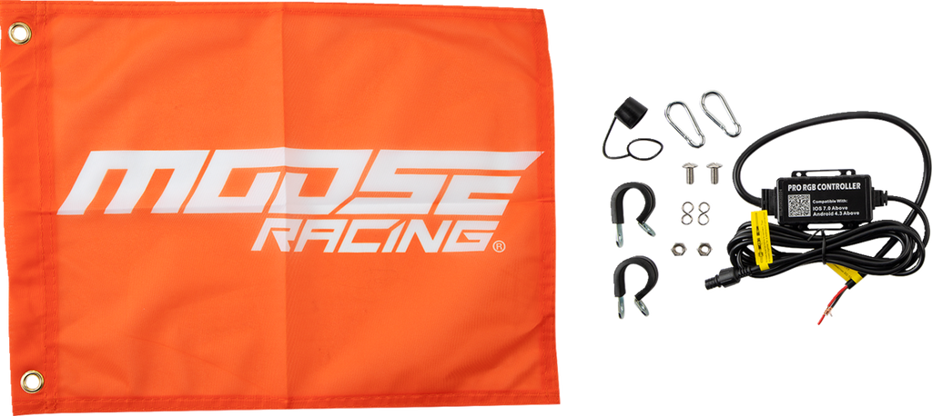 An orange Moose Racing flag with white logo is on the left. On the right is a black electronic controller labeled “PRO LED CONTROLLER,” with wiring, connectors, mounting hardware, screws, and two U-bolts placed separately on a light background.