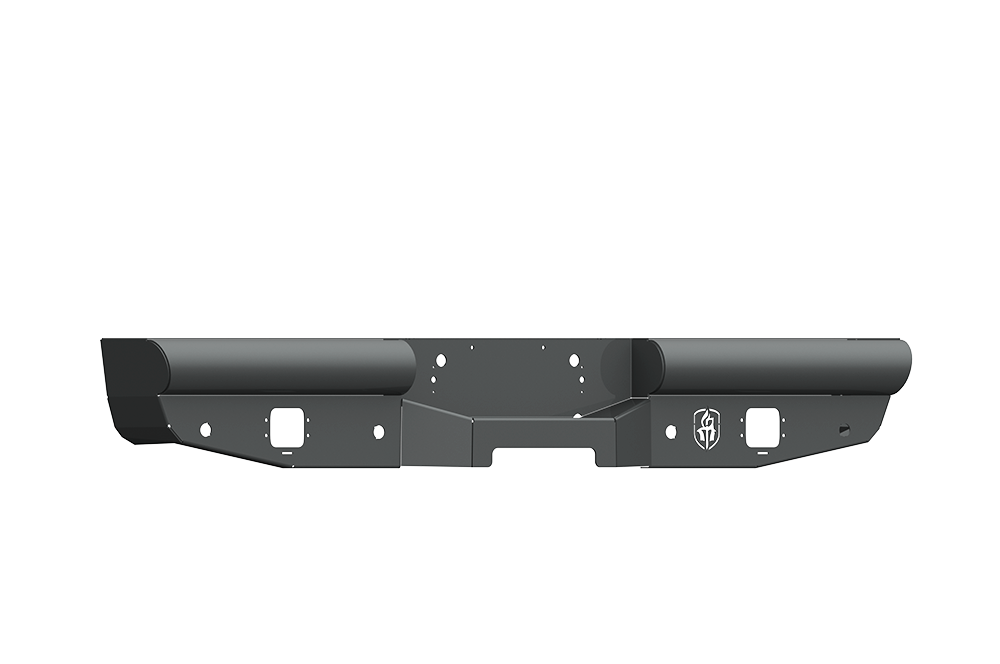 The 1999-2016 Ford F-250 Vaquero Rear Non-Winch Bumper in textured black features an angular metal design with bolt holes and square cutouts, a circular logo on the right, and rounded ends for a rugged, heavy-duty look.