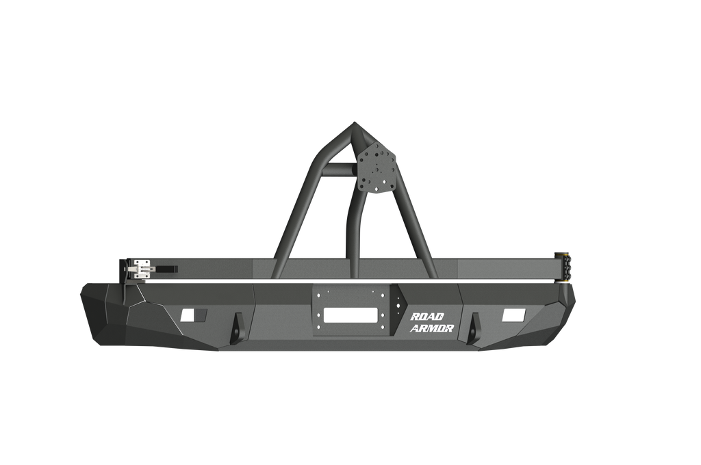 A textured black Stealth Rear Winch Bumper with tire carrier for 1999-2007 Ford Excursion, featuring angular design, reinforced center hoop, winch slot for Warn M8000/9.5Xp, multiple mounting points, and white Road Armor logo for rugged protection.