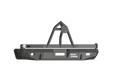 A textured black Stealth Rear Winch Bumper with tire carrier for 1999-2007 Ford Excursion, featuring angular design, reinforced center hoop, winch slot for Warn M8000/9.5Xp, multiple mounting points, and white Road Armor logo for rugged protection.