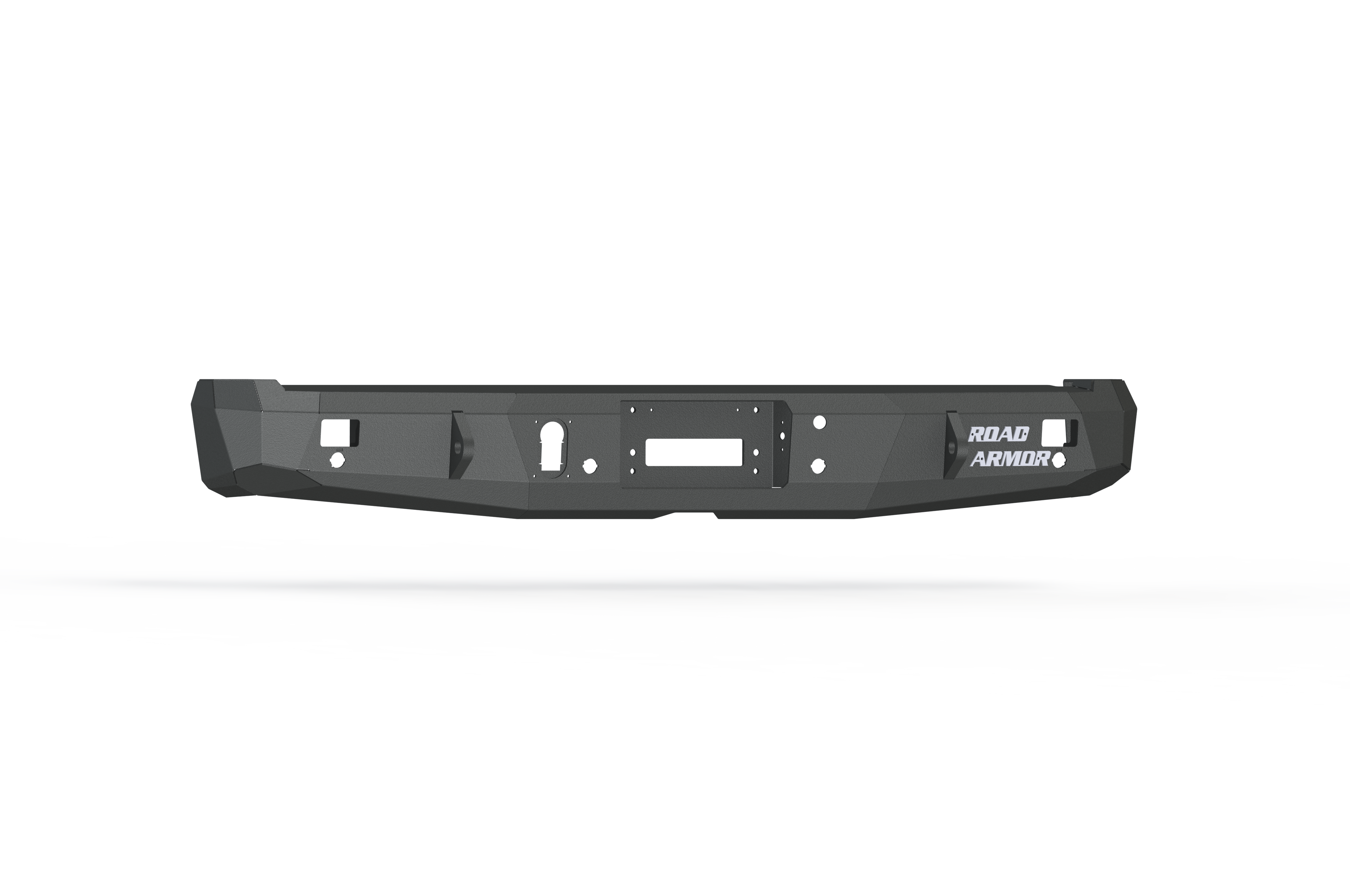 The 2015-2020 Ford F-150 Stealth Rear Winch Bumper in textured black features angular edges, accessory cutouts, and a white Road Armor logo on the right, shown on a plain white background with shadow. Compatible with Warn M8000 or 9.5Xp winches.