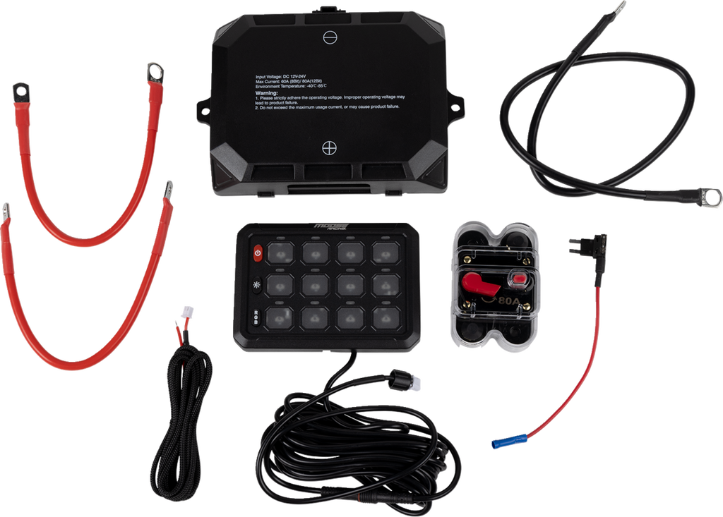 A vehicle switch panel kit with components laid out: a black control box, two red battery cables, a black switch panel with buttons, a fuse block with a red switch, a black grounding cable, and a bundle of connecting wires.