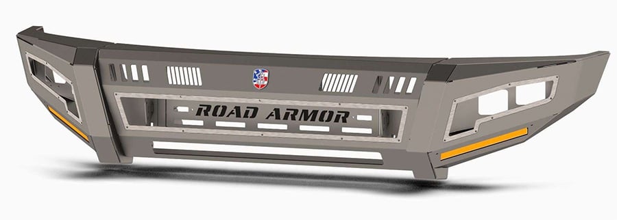 The 2019+ Ram 2500 Identity Front Bumper features a rugged, matte finish with reinforced edges, bold ROAD ARMOR cutout, vent slits, central emblem, angular wide end pods with yellow reflectors, triple cube light pods, shackles, beauty ring & hardware kit.