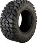 A large, rugged off-road tire is shown upright against a white background. It has deep, aggressive tread patterns with prominent sidewall lugs for strong grip, and RADIAL is visibly molded into the side of the tire.
