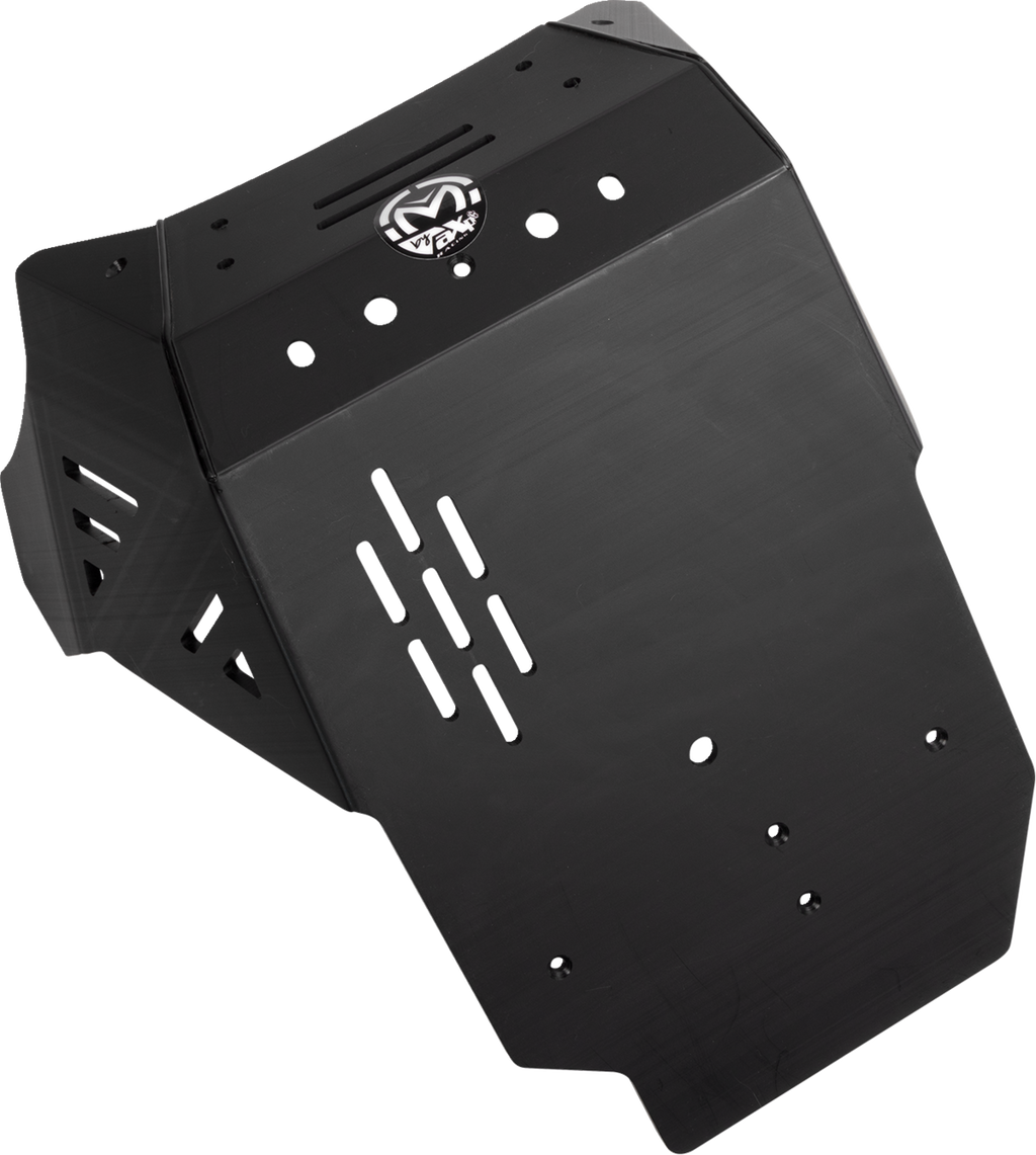 A black, angular metal skid plate with vent slots, mounting holes, and a white “M” logo at the top center. The plate has cut-outs for ventilation or attachment, and is designed to protect vehicle components underneath. The background is white.