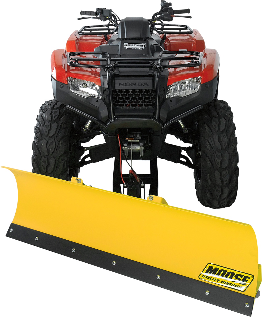 A front-facing red Honda all-terrain vehicle (ATV) with large, rugged tires is equipped with a bright yellow snow plow blade attached to the front. The blade has the “Moose Utility Division” logo in black lettering on the right side.