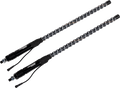 Two black automotive shock absorbers with coiled springs are shown diagonally on a light gray background. The shocks feature connectors and cables at the base, and the springs are metallic with visible orange details along their coils.
