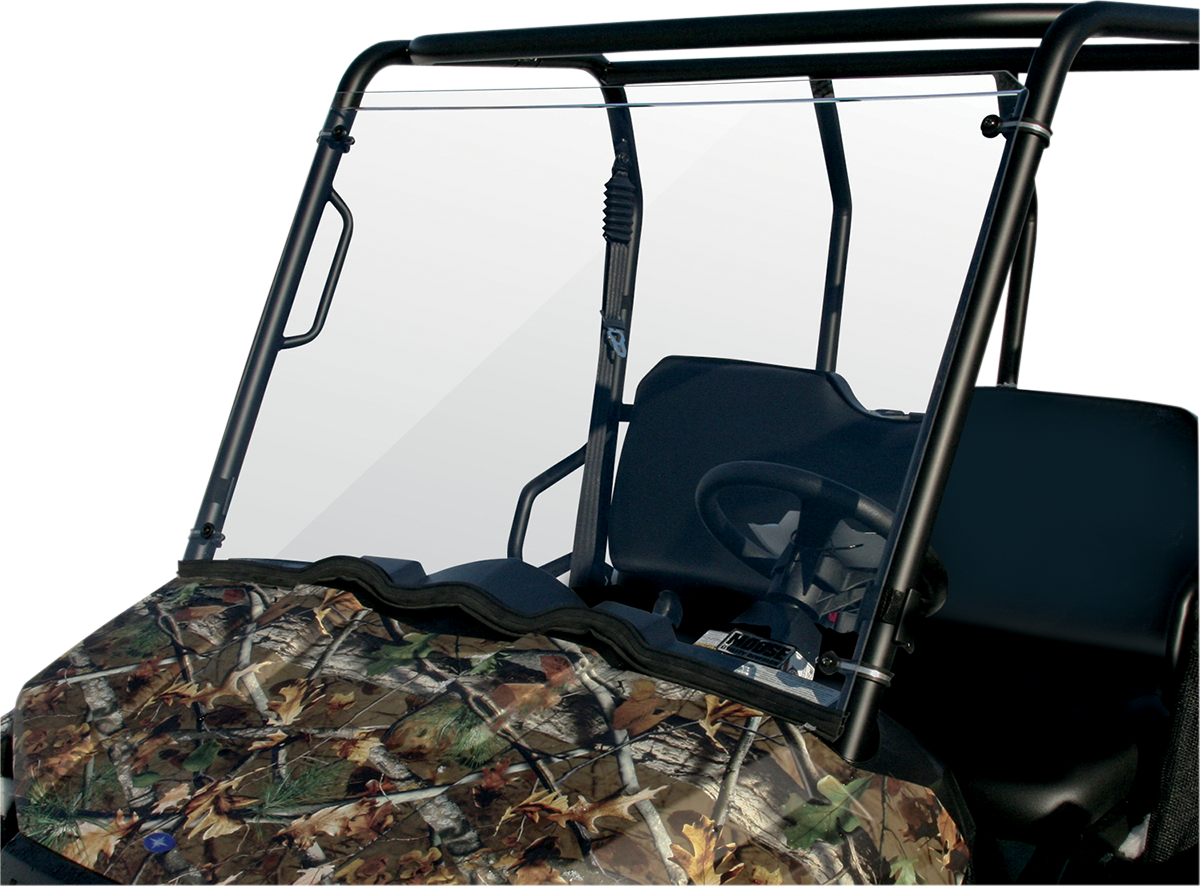 A utility vehicle with a camouflage-patterned hood, a clear windshield, black metal frame, and a simple black steering wheel visible inside. The background is plain white, making the vehicle’s details the main visual focus.