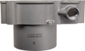 Close-up of a metallic cylindrical engine part with a side opening and engraved text reading CYLINDER WORKS 60005B WC11 B on the smooth lower section. The upper section is thicker and features a rounded extension. The background is plain white.