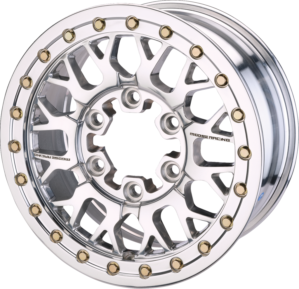 A close-up of a shiny, chrome-finished car wheel rim with intricate cut-out patterns and gold-colored bolts evenly spaced around the edge. The brand name “MOGE RACING” is visible on the rim’s side. The background is plain white.