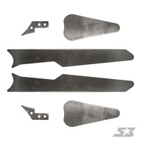 Six steel plates from the S3 Power Sports 2017+ Can-Am Maverick X3 72 Trailing Arms Weld-In Gusset Kit are shown on a white background, each varying in size and shape with different edges and holes for assembly.