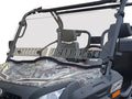 A close-up of a Cf Moto U-Force 500/800 (2015+) side-by-side with a dual-venting scratch-resistant windshield, camouflage body, black frame, metal brackets, vents at the bottom edge, and two seats for off-road use.
