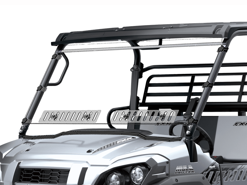 A close-up of a Kawasaki Mule Pro-Fxr Full Scratch Resistant Windshield w/Dual Vents (2017+), showing two clear, adjustable glass panels with vent slots, black metal brackets, a sturdy black frame, and two overhead light bars.