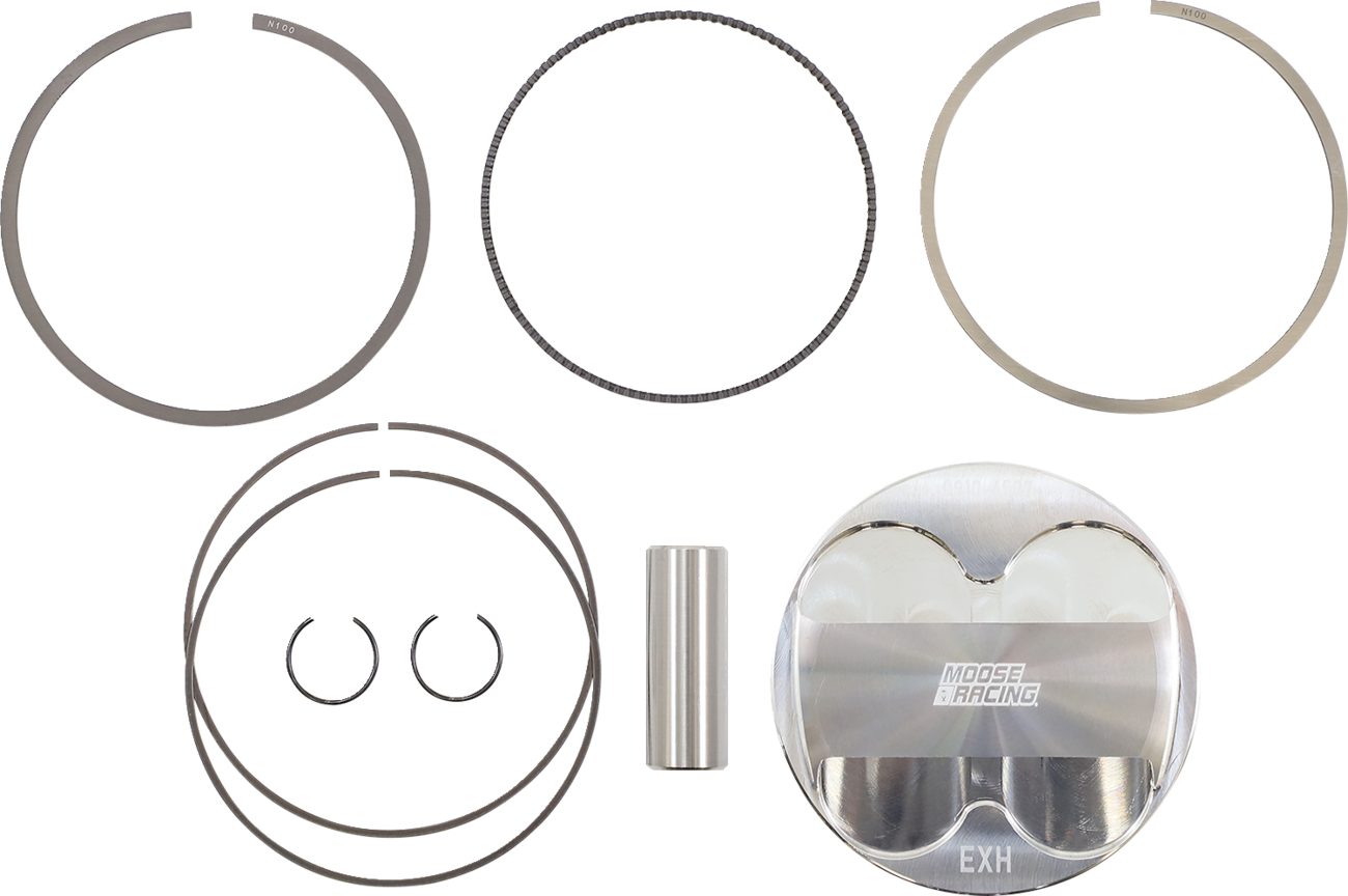 An arrangement of engine piston components, including a piston with “MOOSE RACING” and “EXH” engraved, piston rings, a wrist pin, two circlips, and circular ring sets, all displayed on a plain white background.