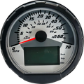 A close-up of a round speedometer with a black outer rim. The dial shows speeds from 0 to 70 in large black numbers, labeled MPH, with a smaller KM/H scale. A red needle points to 5 MPH. There is a digital display and indicators for tach, trip, and odo at