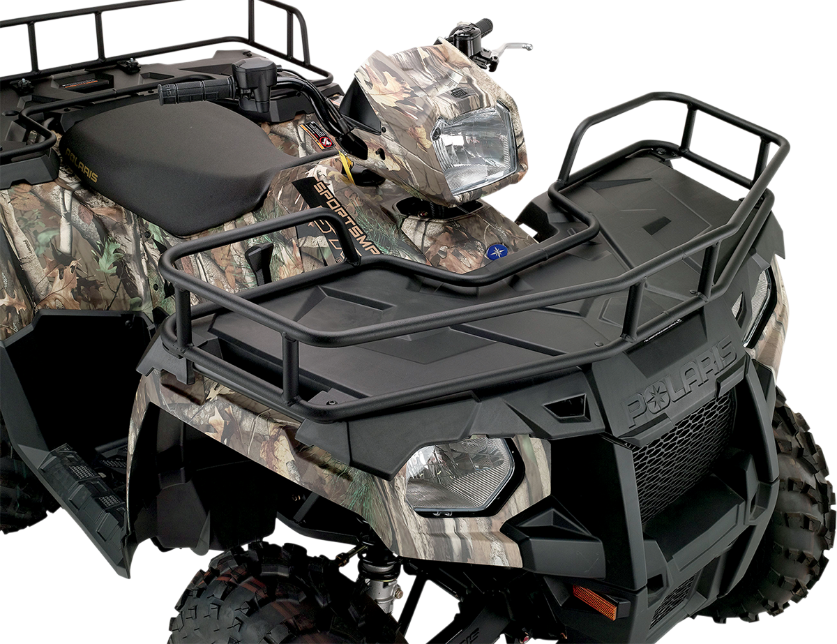 A close-up of a camouflage-patterned Polaris ATV, showing the front rack, large headlight, black seat, rugged tires, and protective bars, all set against a white background. The texture and details of the vehicle’s body and accessories are clearly visible