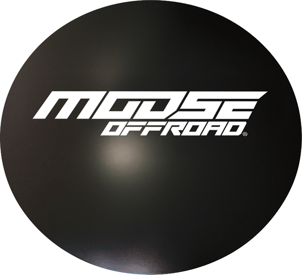 A round black object with the bold white text MOOSE OFFROAD in a modern, angular font centered on it. The surface has a subtle shine and a slight reflection, giving it a glossy appearance.