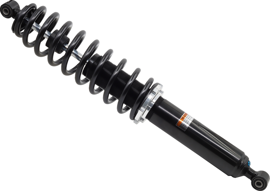 A close-up of a black automotive shock absorber with a coil spring wrapped around it, featuring a metal mounting bracket and adjustment rings along the middle section, isolated on a white background.