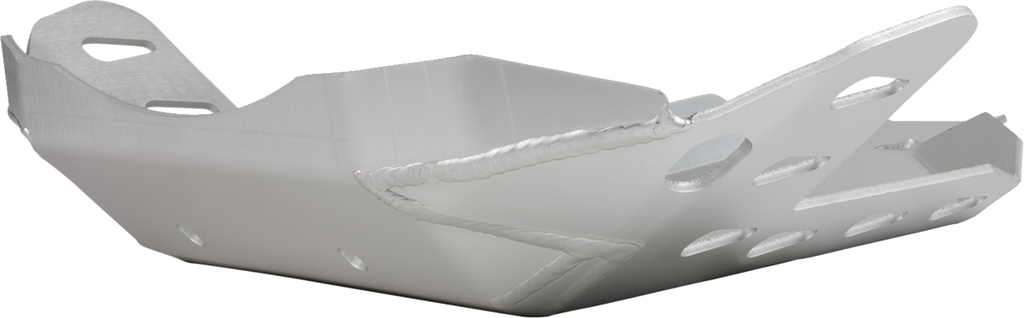 A silver metal skid plate with visible welds, beveled edges, and several cut-out holes for mounting and weight reduction, photographed against a plain white background.
