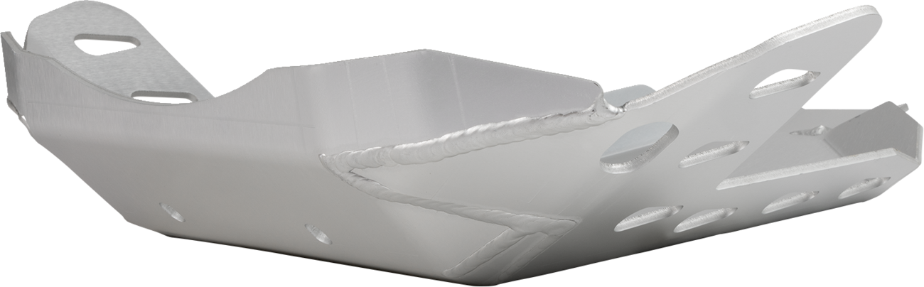 A silver metal skid plate with visible welds, beveled edges, and several cut-out holes for mounting and weight reduction, photographed against a plain white background.