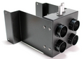 The Inferno Cab Heater Kit With Defrost for 2014-Current Kawasaki Teryx Teryx4 800 is a black metal rectangular unit featuring four round ports on one side, two vertical silver connectors on top, and side flanges with mounting holes for installation.