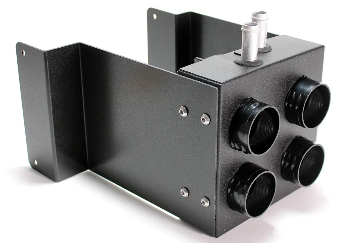 The Inferno Cab Heater Kit With Defrost for 2014-Current Kawasaki Teryx Teryx4 800 is a black metal rectangular unit featuring four round ports on one side, two vertical silver connectors on top, and side flanges with mounting holes for installation.