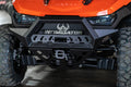 Close-up of the orange off-road vehicle’s Gc1K Front Bumper featuring INTIMIDATOR branding, a stylized bull logo, rugged tires, winch mount, black bumper, plus detailed suspension and headlight design.