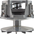 Close-up of a metal mechanical component, possibly a clutch or pulley system. The structure has a cylindrical base, a flat round plate at the bottom with a central shaft, visible springs, and machined surfaces, showcasing industrial engineering.