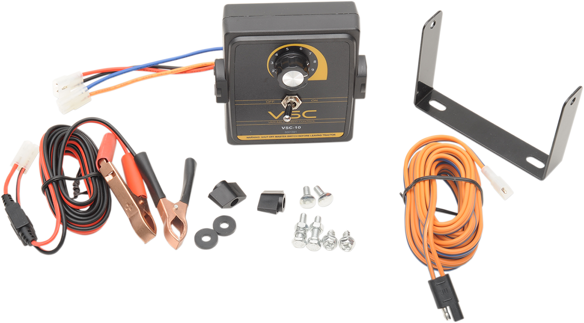 A vehicle speed control kit with wires, a black control box with a dial, orange and blue cables, alligator clips, a metal mounting bracket, various screws, nuts, and connectors, all arranged on a white background.