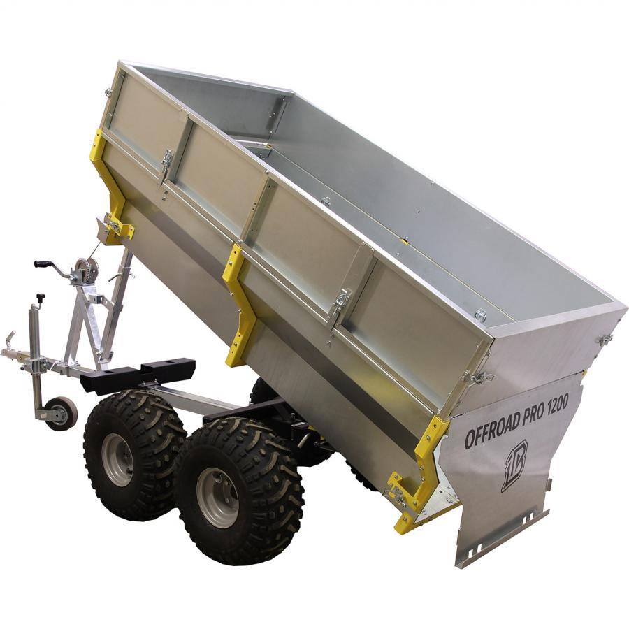 A large silver metal Offroad Trailer 2600lb Capacity w/ 2 Ball Hitch features chunky black tires, a tilting dump bed, yellow hinges and reinforcements, plus a front hitch for towing. OFFROAD PRO 1200 is labeled on the side.