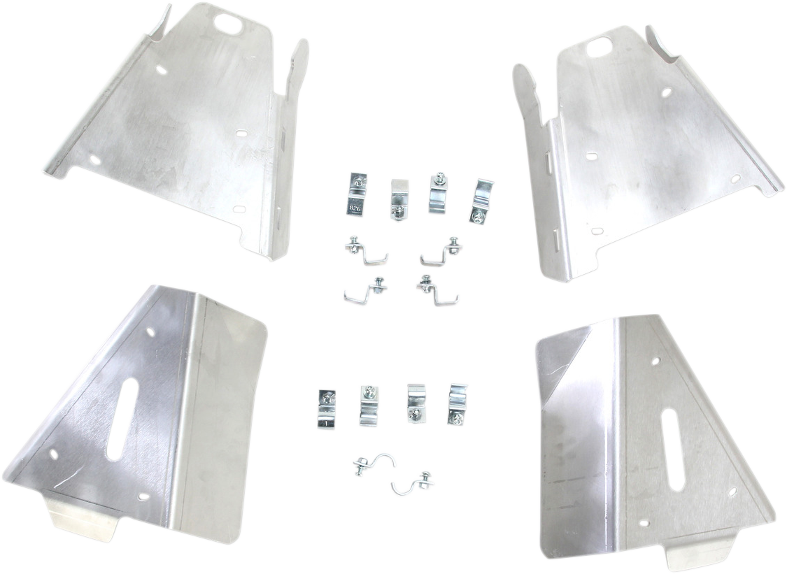 Four metallic plates with cutouts and rounded edges are arranged around small metal clips, brackets, nuts, and bolts, all on a white background. The plates vary slightly in shape, with mounting holes and slots for assembly.