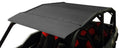 A close-up of the Polaris General-4 ABS Roof 2017+ installed on an off-road utility vehicle with an open cabin, featuring red and black padded seats. The black roof is secured with visible bolts along its edges.